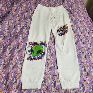 Dollskill current mood vibe check airbrushed joggers alien rose